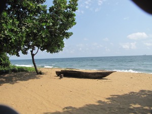 Boat on the Atlantic beach south of the port city of Douala.